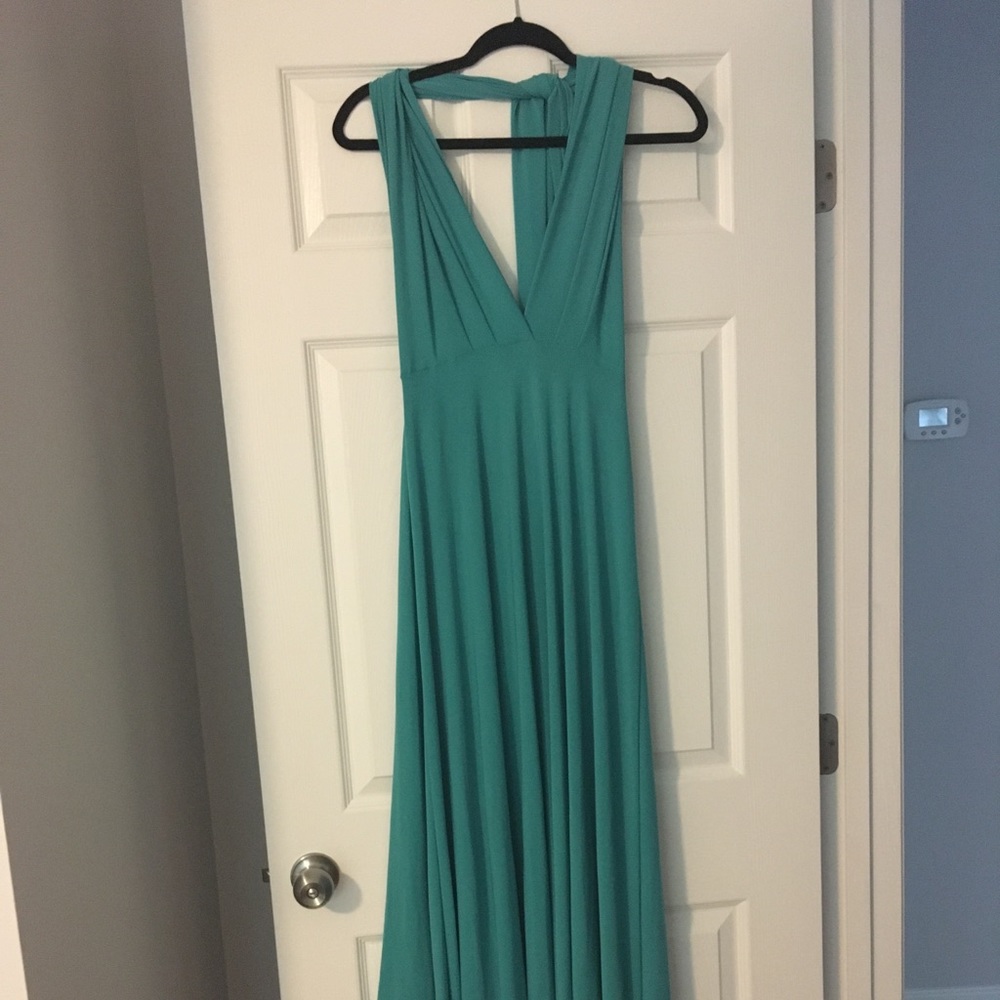 NWOT Teal multi-way maxi dress.